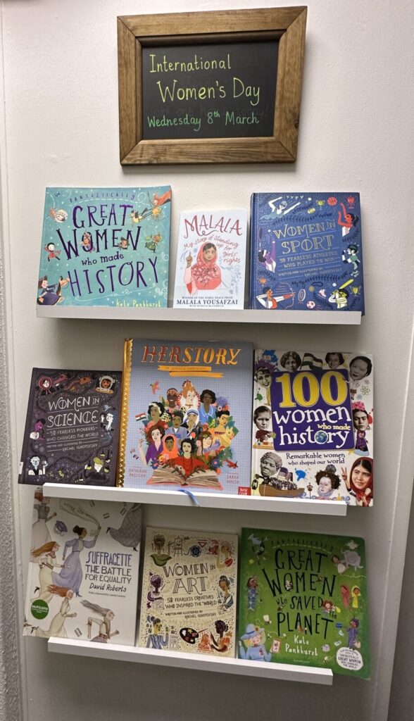 A selection of topical books with ‘International Women’s Day’ written above